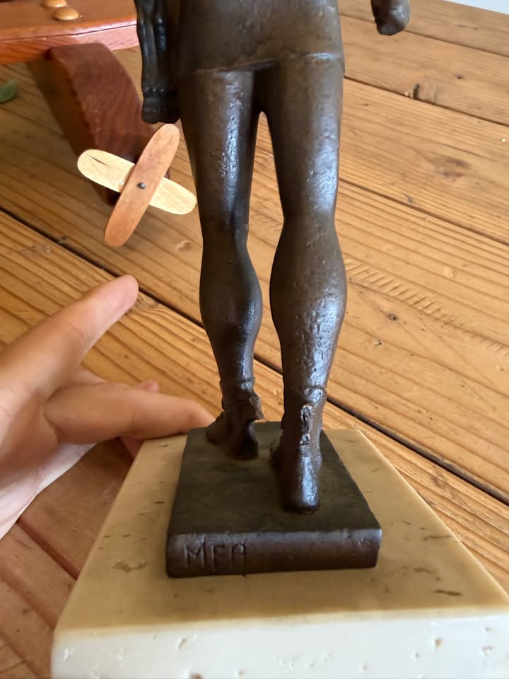 MFA mark on the back of the figure