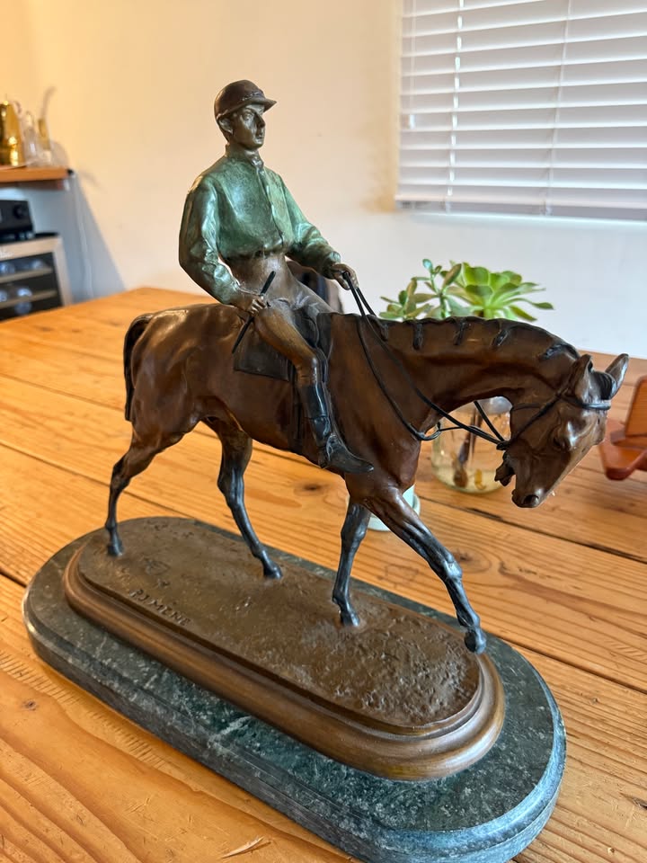 Horse and jockey sculpture, full view