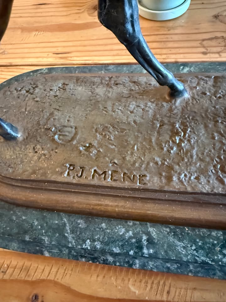 P.J. MENE signature on the base